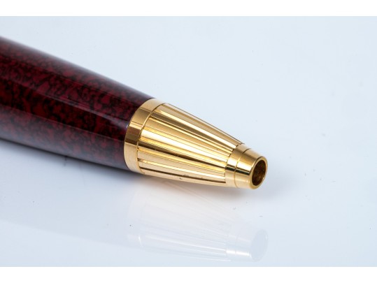 Cartier Iconic Ribbed Marbled Burgundy Composite And Gold Tone Ballpoint Pen