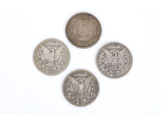 Four Morgan Silver Dollars