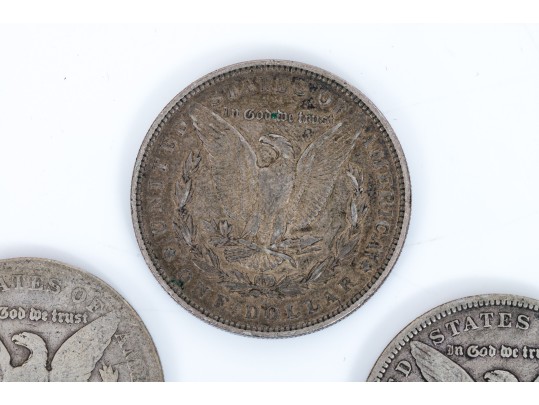 Four Morgan Silver Dollars