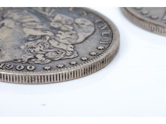 Four Morgan Silver Dollars