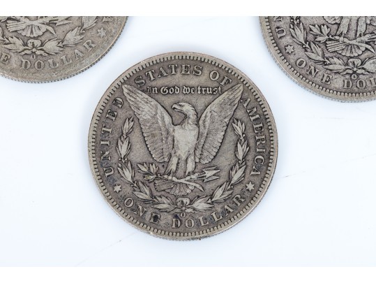 Four Morgan Silver Dollars