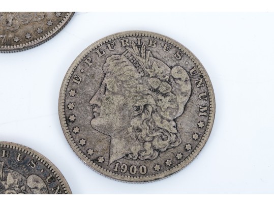 Four Morgan Silver Dollars