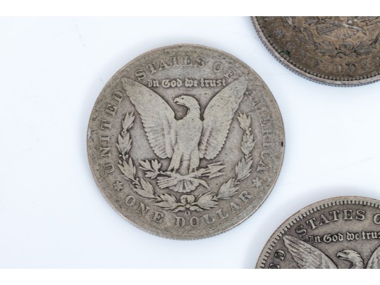 Four Morgan Silver Dollars