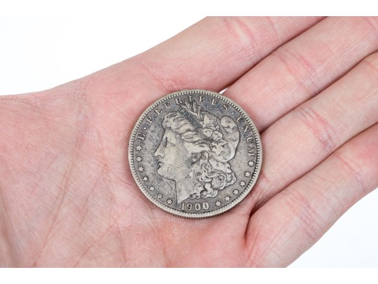 Four Morgan Silver Dollars