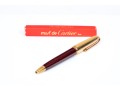 Cartier Iconic Ribbed Marbled Burgundy Composite And Gold Tone Ballpoint Pen
