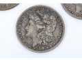 Four Morgan Silver Dollars