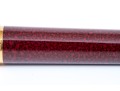 Cartier Iconic Ribbed Marbled Burgundy Composite And Gold Tone Ballpoint Pen