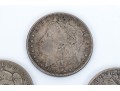 Four Morgan Silver Dollars
