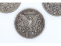 Four Morgan Silver Dollars