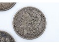Four Morgan Silver Dollars