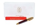 Cartier Iconic Ribbed Marbled Burgundy Composite And Gold Tone Ballpoint Pen