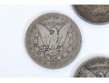 Four Morgan Silver Dollars