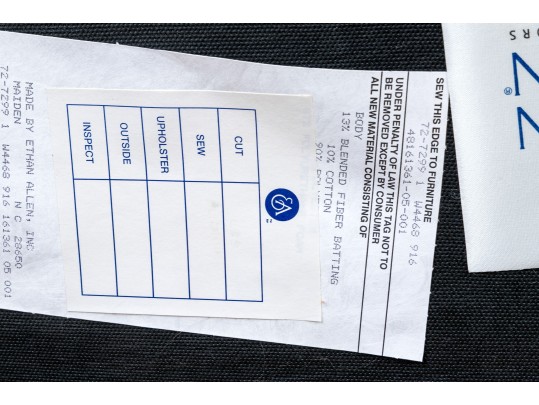 Ethan Allen Leather Upholstered Ottoman On Casters