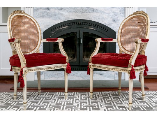 Elegant Pair Of Antique Louis XVI Style Fauteuils With Cane Backs And Musical Theme Crests
