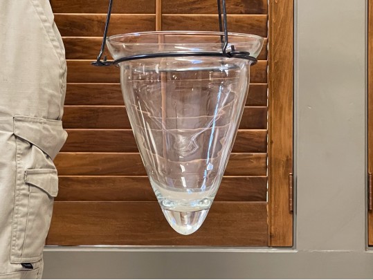 A Pair Of Decorative Glass Hanging Vases