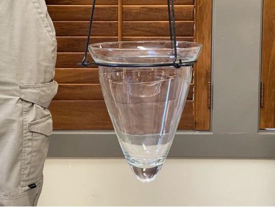 A Pair Of Decorative Glass Hanging Vases