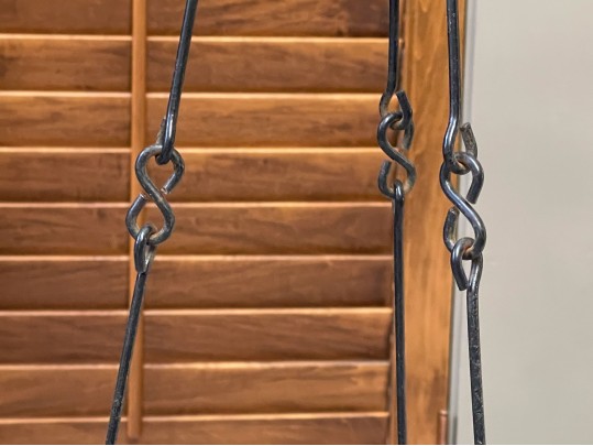 A Pair Of Decorative Glass Hanging Vases