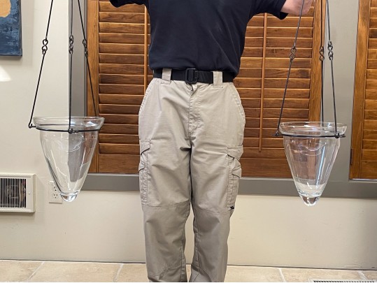 A Pair Of Decorative Glass Hanging Vases