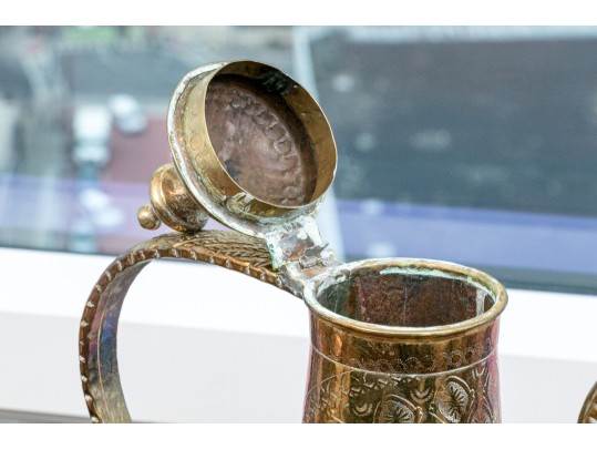 Collection Of Four Antique Middle Eastern Metal Ewers