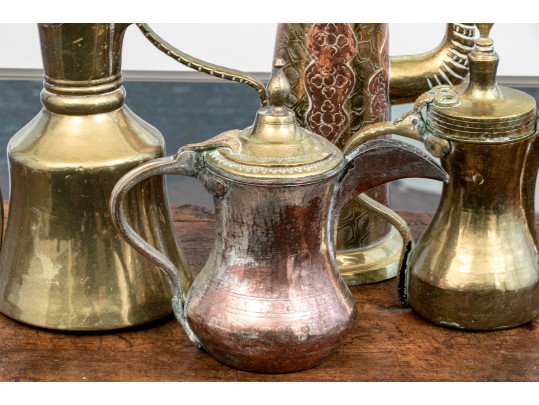 Collection Of Four Antique Middle Eastern Metal Ewers