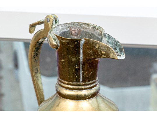 Collection Of Four Antique Middle Eastern Metal Ewers