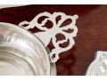 Four Pieces Of Sterling Silver, 21.7 Ozt