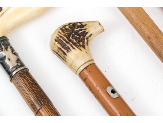 Lot Of Five Assorted Canes, Assorted Woods, Including A Hand Motif