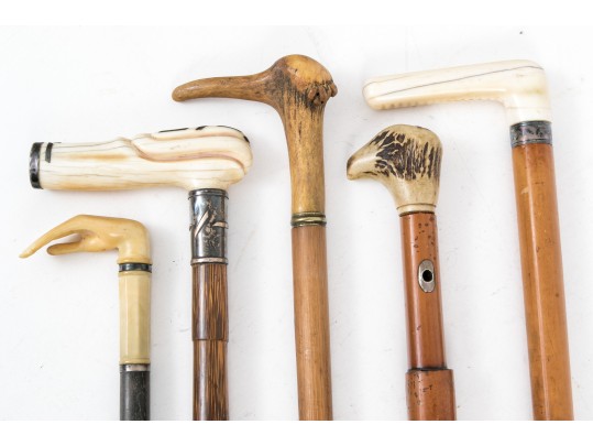 Lot Of Five Assorted Canes, Assorted Woods, Including A Hand Motif