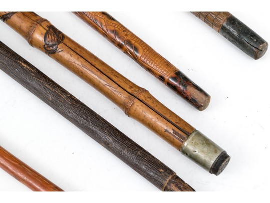Lot Of Five Assorted Canes And Walking Sticks, Assorted Carved And Painted Or Stained Woods