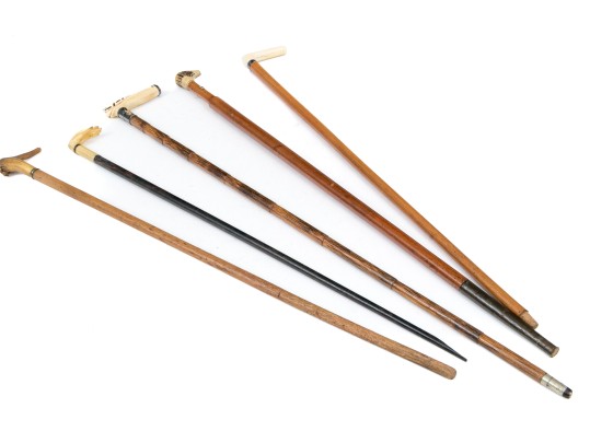 Lot Of Five Assorted Canes, Assorted Woods, Including A Hand Motif