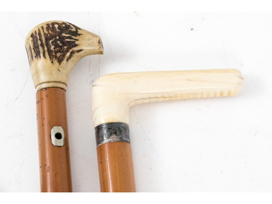 Lot Of Five Assorted Canes, Assorted Woods, Including A Hand Motif