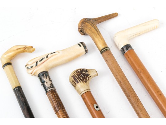 Lot Of Five Assorted Canes, Assorted Woods, Including A Hand Motif