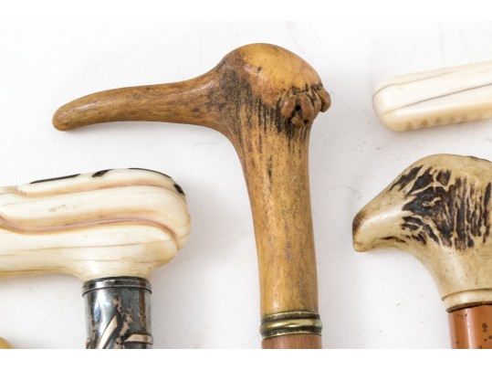 Lot Of Five Assorted Canes, Assorted Woods, Including A Hand Motif