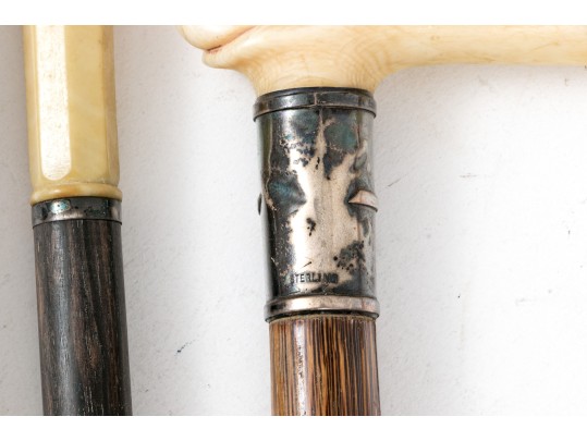 Lot Of Five Assorted Canes, Assorted Woods, Including A Hand Motif