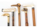 Lot Of Five Assorted Canes, Assorted Woods, Including A Hand Motif