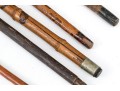 Lot Of Five Assorted Canes And Walking Sticks, Assorted Carved And Painted Or Stained Woods