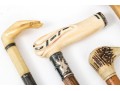 Lot Of Five Assorted Canes, Assorted Woods, Including A Hand Motif