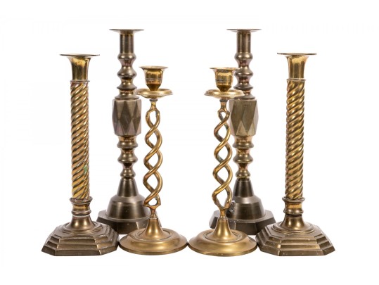 Three Pairs Of Brass Candlesticks