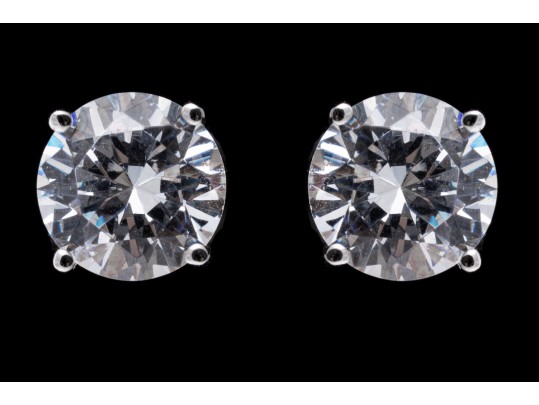 Sterling Silver And Zirconia Stud Earrings.