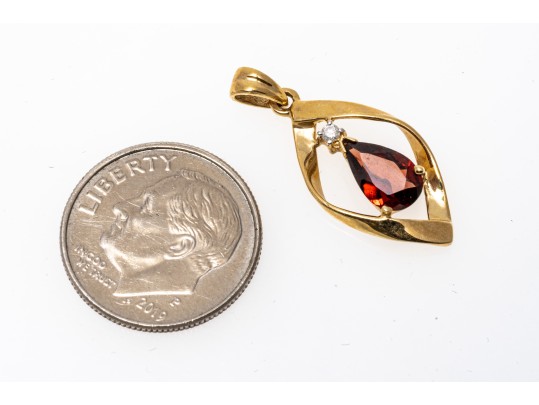 14k Yellow Gold Lovely Pear Garnet And Diamond Topped Swirl Pendant