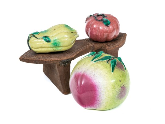 Collection Of Three Naturalistic Chinese Ceramic Fruit On A Wooden Pedestal