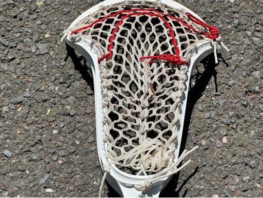 Three Lacrosse Girls Lacrosse Sticks