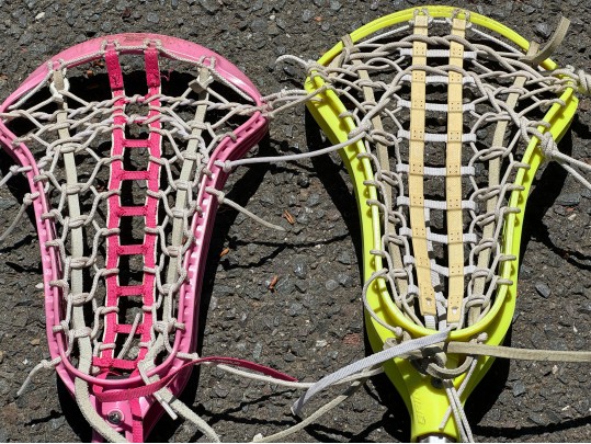 Three Lacrosse Girls Lacrosse Sticks