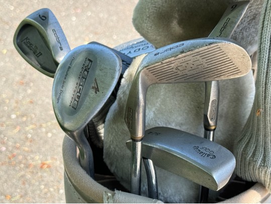 Thirteen Golf Clubs With Bag