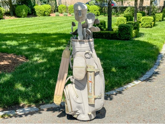 Thirteen Golf Clubs With Bag