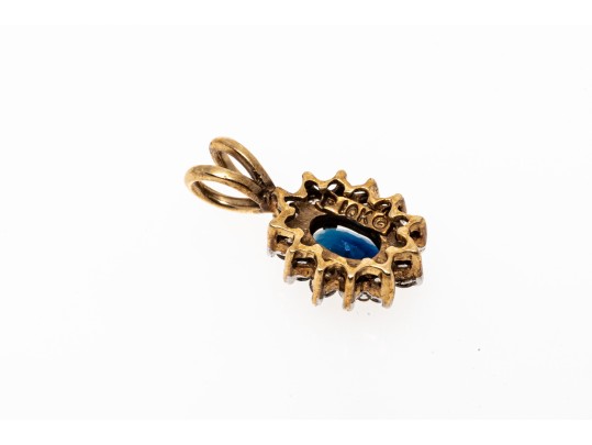 10K Sapphire And Diamond Halo Pendant