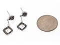 14k White Gold Striking Black Diamond And White Sapphire Drop Earrings