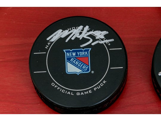 Three Autographed New York Rangers NHL Pucks 