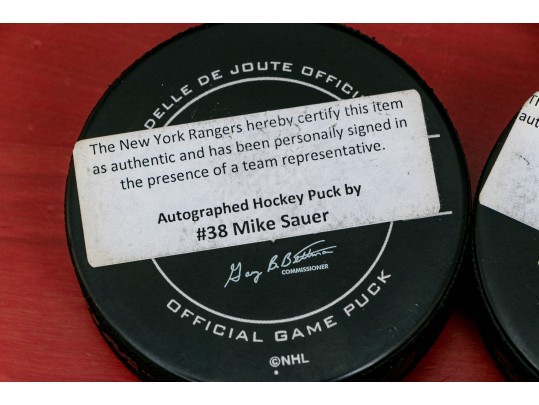 Three Autographed New York Rangers NHL Pucks 