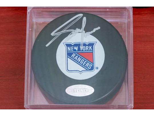 Three Autographed New York Rangers NHL Pucks 